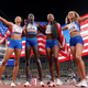 The United States team of Allyson Felix, Athing Mu, Dalilah Muhammad and Sydney Mclaughlin, from left, celebrate winning the gold medal in the final of the women’s 4 x 400-meter relay at the 2020 Summer Olympics, Saturday, Aug. 7, 2021, in Tokyo, Japan.